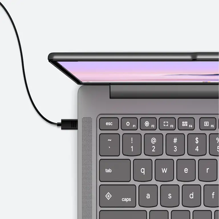Chromebook plugged in and charging.